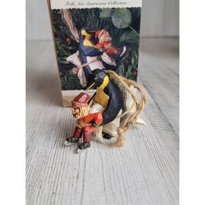 Hallmark 1995 learning to skate folk art ornament Xmas